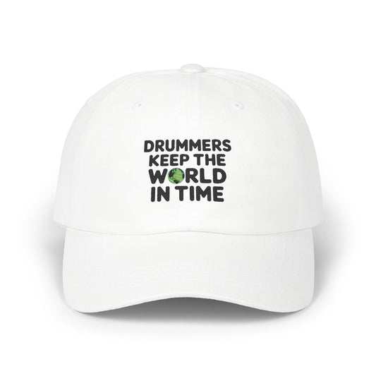 White baseball cap with the text 'DRUMMERS KEEP THE WORLD IN TIME' printed on the front.